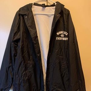Black windbreaker